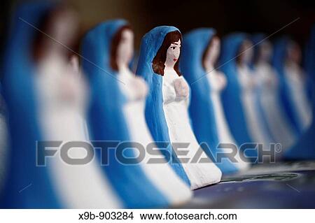 Hand painted Virgin Mary figurines Azores islands handicraft, made in Capelas, Sao Miguel island View Large Photo Image Picture - Hand painted Virgin Mary figurines Azores islands handicraft, made in Capelas, Sao Miguel island. Fotosearch