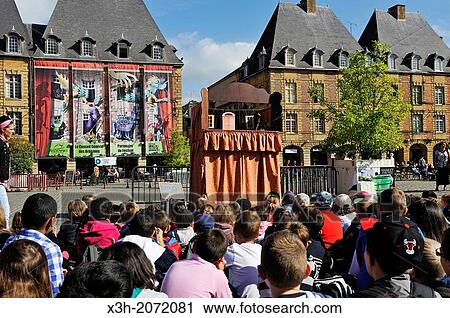 hand puppets show on the Place Ducale, Festival Mondial des Theatres de Marionnettes world festival of puppets show, Charleville-Mezieres, Ardennes departement, Champagne-Ardenne region, Northern France, Europe. View Large Photo Image Stock Image - hand puppets show on the Place Ducale, Festival Mondial des Theatres de Marionnettes world festival of puppets show, Charleville-Mezieres, Ardennes departement, Champagne-Ardenne region, Northern France, Europe.. Fotosearch