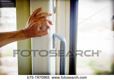 Hand resting inside a train View Large Photo Image Stock Photography - Hand resting inside a train. Fotosearch