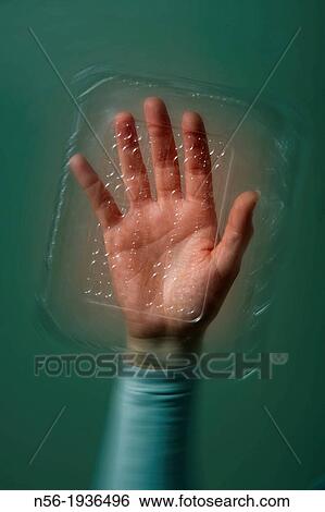 Stock Photograph - Hand up with cover. Fotosearch