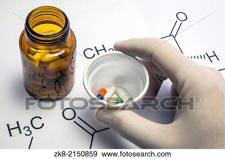 Hand with blue white glove holding white plastic cup with several pills. View Large Photo Image Stock Photo - Hand with blue white glove holding white plastic cup with several pills.. Fotosearch