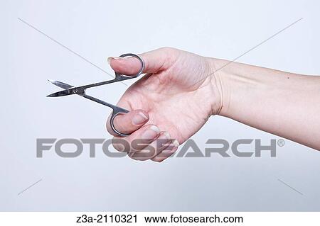 Hand With Nail Scissors, Hand Gesture, Studio shot View Large Photo Image Stock Image - Hand With Nail Scissors, Hand Gesture, Studio shot. Fotosearch