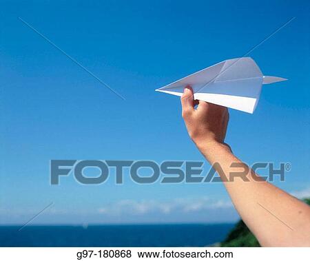 Hand with paper plane View Large Photo Image Stock Photo - Hand with paper plane. Fotosearch