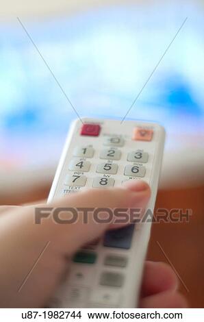Hand with Remote Control. View Large Photo Image Picture - Hand with Remote Control.. Fotosearch