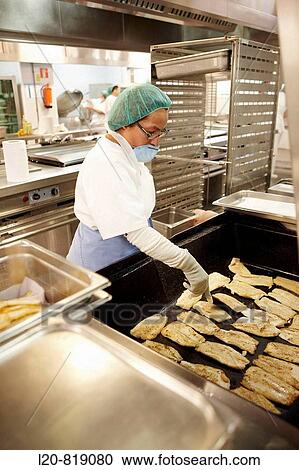 Handling food (grilled fish) in kitchen. Hospital Universitario de Gran Canaria Doctor Negrin, Las Palmas de Gran Canaria. Canary Islands, Spain View Large Photo Image Stock Image - Handling food (grilled fish) in kitchen. Hospital Universitario de Gran Canaria Doctor Negrin, Las Palmas de Gran Canaria. Canary Islands, Spain. Fotosearch