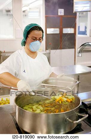 Stock Image - Handling food (vegetables) in kitchen. Hospital Universitario de Gran Canaria Doctor Negrin, Las Palmas de Gran Canaria. Canary Islands, Spain. Fotosearch