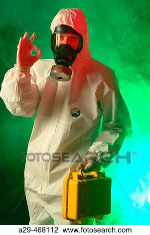 Stock Image - Handling toxic products.. Fotosearch