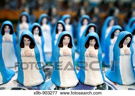 Handpainted Virgin Mary figurines Azores islands handicraft, made in Capelas, Sao Miguel island View Large Photo Image Stock Photo - Handpainted Virgin Mary figurines Azores islands handicraft, made in Capelas, Sao Miguel island. Fotosearch