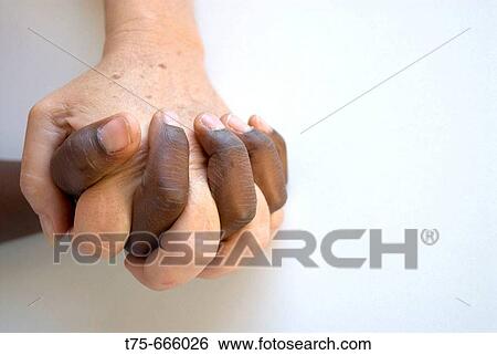 Stock Photograph - Hands clasped. Fotosearch