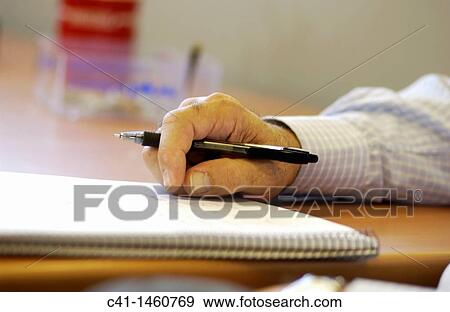 Stock Photo - Hands in a office. Fotosearch