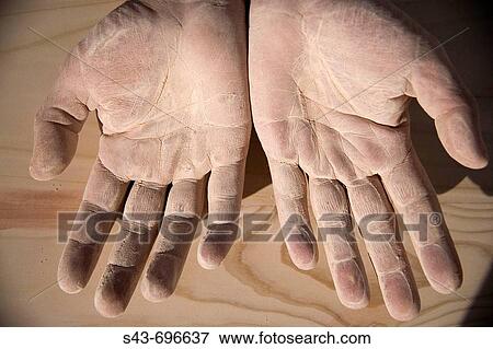 Stock Photo - Hands of a carpenter. Fotosearch