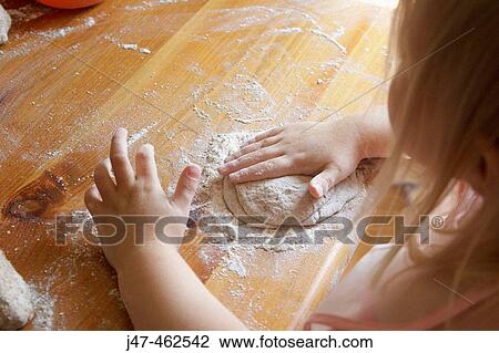 Hands of a child baking View Large Photo Image Stock Image - Hands of a child baking. Fotosearch