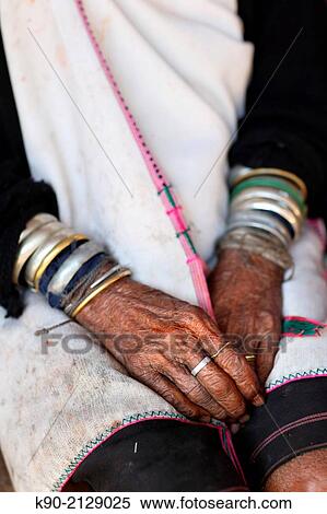 Hands of a Longneck Karen woman, Mae Hong Son, Thailand, Southeast Asia. View Large Photo Image Stock Photography - Hands of a Longneck Karen woman, Mae Hong Son, Thailand, Southeast Asia.. Fotosearch