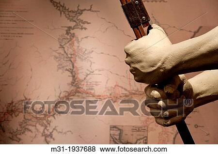 Stock Photo - Hands of a worker of early Panama Canal construction at Miraflores Locks museum, Panama Canal, Panama, Central America. Fotosearch
