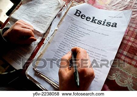 Hands of an albino man working as a public writer. Ethiopia. View Large Photo Image Stock Photo - Hands of an albino man working as a public writer. Ethiopia.. Fotosearch