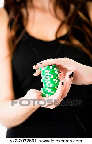 Hands of woman holding green poker chips. View Large Photo Image Stock Image - Hands of woman holding green poker chips.. Fotosearch