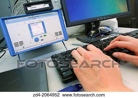 Stock Image - Hands on computer keyboard. Researcher. Industry. Tecnalia Research & innovation. Technology and Research Centre. Miramon Technological Park. San Sebastian. Donostia. Gipuzkoa. Basque Country. Spain.. Fotosearch