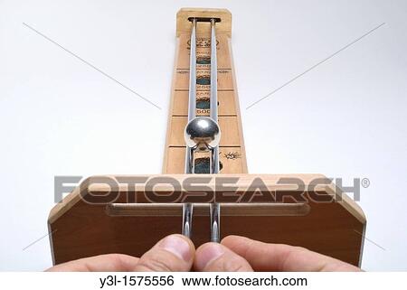 Hands playing at a Marble Tabletop Game View Large Photo Image Stock Photograph - Hands playing at a Marble Tabletop Game. Fotosearch