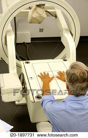 Hands scintigraphy, Scintigraphy is a form of diagnostic test used in nuclear medicine, wherein radioisotopes are taken internally, and the emitted radiation is captured by external detectors gamma cameras to form two-dimensional images View Large Photo Image Stock Image - Hands scintigraphy, Scintigraphy is a form of diagnostic test used in nuclear medicine, wherein radioisotopes are taken internally, and the emitted radiation is captured by external detectors gamma cameras to form two-dimensional images. Fotosearch