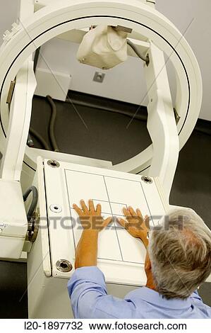 Stock Image - Hands scintigraphy, Scintigraphy is a form of diagnostic test used in nuclear medicine, wherein radioisotopes are taken internally, and the emitted radiation is captured by external detectors gamma cameras to form two-dimensional images. Fotosearch
