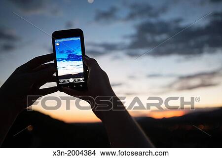 Hands taking Photo with Phone. View Large Photo Image Picture - Hands taking Photo with Phone.. Fotosearch