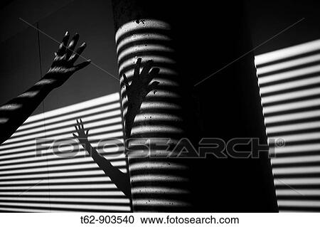 Hands with lights and shadows on the wall Inside Lines Black and white View Large Photo Image Stock Image - Hands with lights and shadows on the wall Inside Lines Black and white. Fotosearch