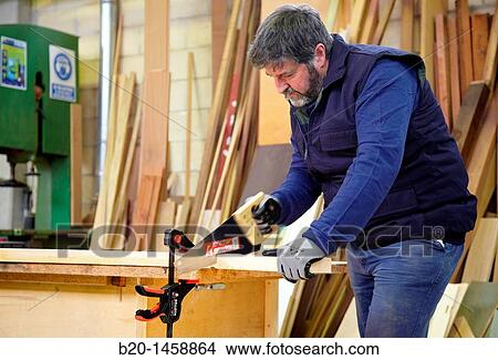 Handsaw, woodworking and carpentry View Large Photo Image Picture - Handsaw, woodworking and carpentry. Fotosearch