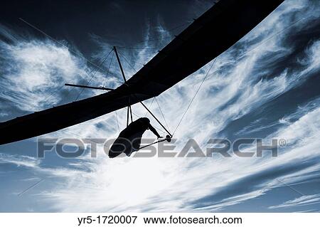 Hang Glider at sunset View Large Photo Image Stock Photo - Hang Glider at sunset. Fotosearch