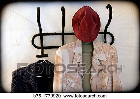 Hanger with blouse, feminine dress and hat, View Large Photo Image Stock Image - Hanger with blouse, feminine dress and hat,. Fotosearch