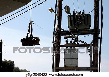 hanging basket and power lines in parga greece. View Large Photo Image Stock Image - hanging basket and power lines in parga greece.. Fotosearch