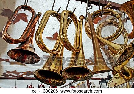 hanging horns, musical instruments. View Large Photo Image Stock Photograph - hanging horns, musical instruments.. Fotosearch