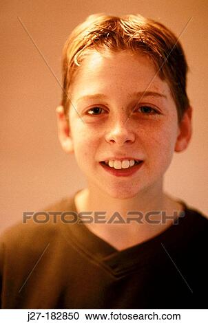 Happy 12 year old boy looking at viewer View Large Photo Image Stock Image - Happy 12 year old boy looking at viewer. Fotosearch