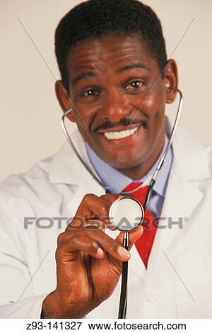 Happy african-american doctor View Large Photo Image Stock Photo - Happy african-american doctor. Fotosearch