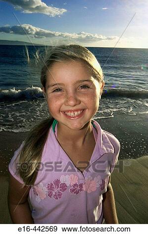 Stock Photo - happy Beach girl. Fotosearch