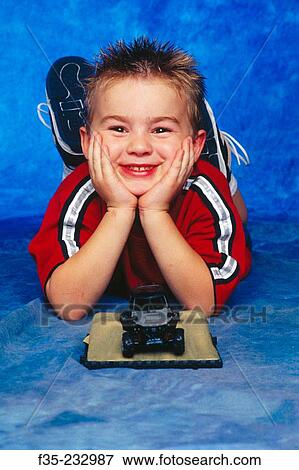 Happy Boy with Toy Car View Large Photo Image Stock Photo - Happy Boy with Toy Car. Fotosearch