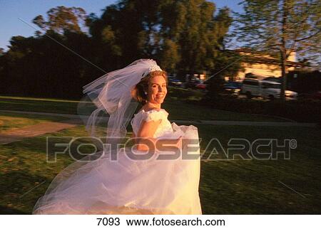 Happy bride running View Large Photo Image Stock Image - Happy bride running. Fotosearch