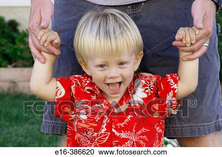 happy child holding father's hands View Large Photo Image Stock Image - happy child holding father's hands. Fotosearch