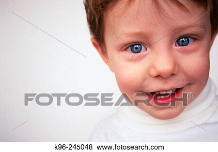 Stock Photo - Happy Child Portrait. Fotosearch