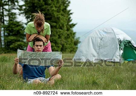 Picture - Happy Couple Camping. Fotosearch