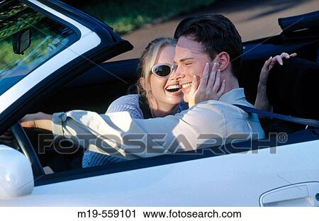 happy couple in a convertible View Large Photo Image Stock Image - happy couple in a convertible. Fotosearch