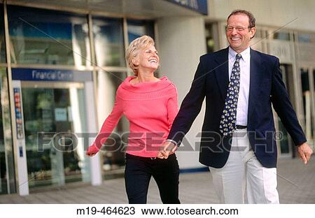 happy couple leaving a financial institution View Large Photo Image Stock Image - happy couple leaving a financial institution. Fotosearch