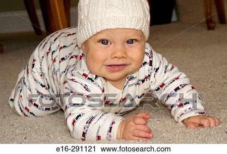 Stock Image - happy crawling baby. Fotosearch