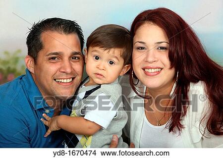 Happy family posing in the Studio View Large Photo Image Picture - Happy family posing in the Studio. Fotosearch