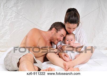 Stock Image - happy family. Fotosearch