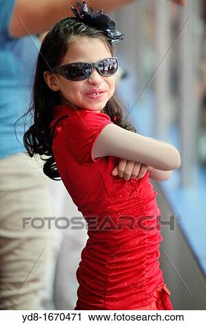 Happy girl in a presentation in Ice Skating, Miami, Florida, USA View Large Photo Image Stock Image - Happy girl in a presentation in Ice Skating, Miami, Florida, USA. Fotosearch