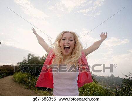 Happy girl screams out her joy, Los Angeles, CA, USA View Large Photo Image Stock Photography - Happy girl screams out her joy, Los Angeles, CA, USA. Fotosearch