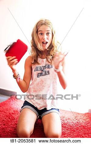Happy girl with red bag View Large Photo Image Stock Image - Happy girl with red bag. Fotosearch