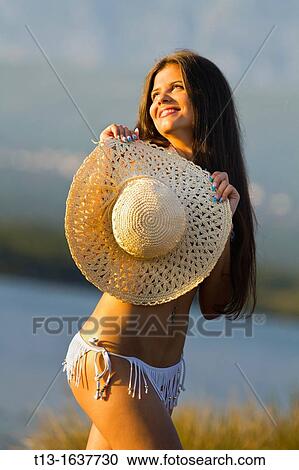 Happy in the sunset young woman View Large Photo Image Stock Image - Happy in the sunset young woman. Fotosearch