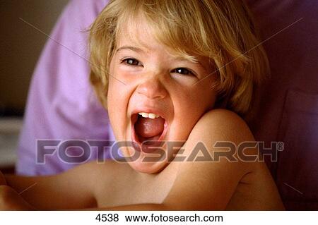 Stock Photo - Happy kid. Fotosearch