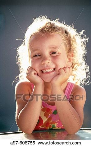 Stock Photography - Happy little girl. Fotosearch